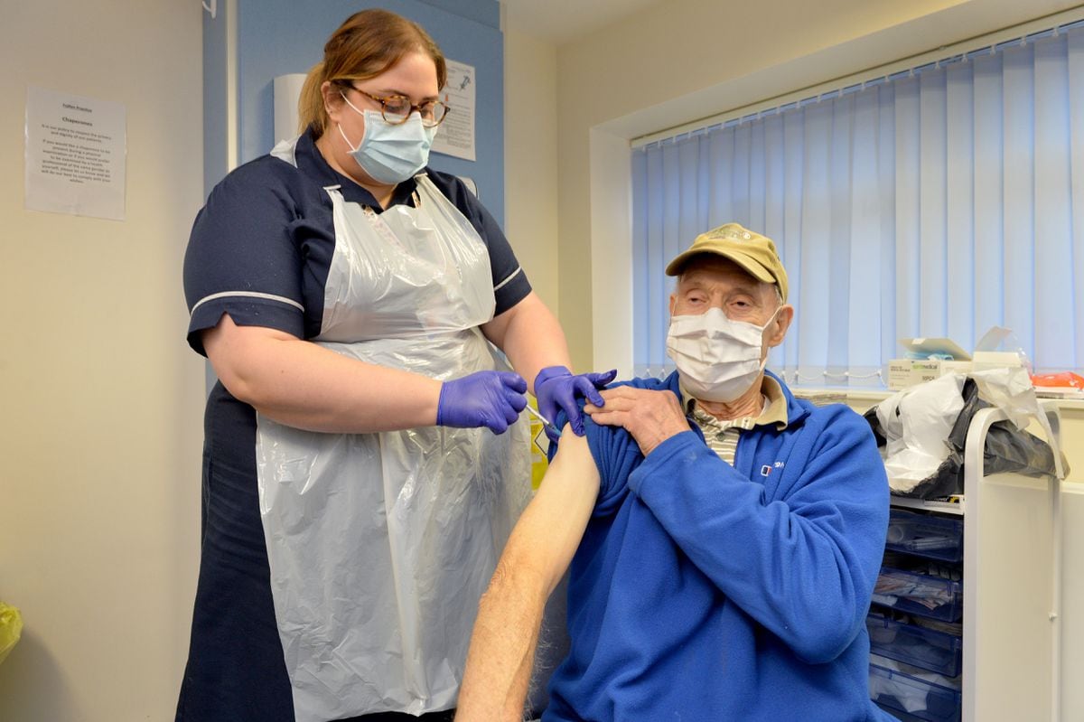 A nurse gives the Covid-19 vaccination to a patient at the medical centre in Burntwood.