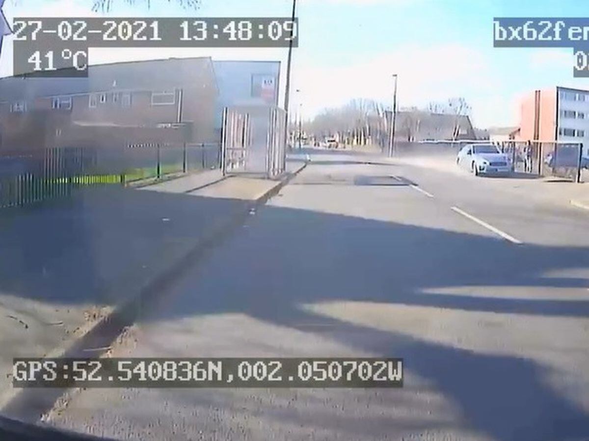 The dashcam footage shows the stolen vehicle mounting the pavement. Photo: West Midlands Police.