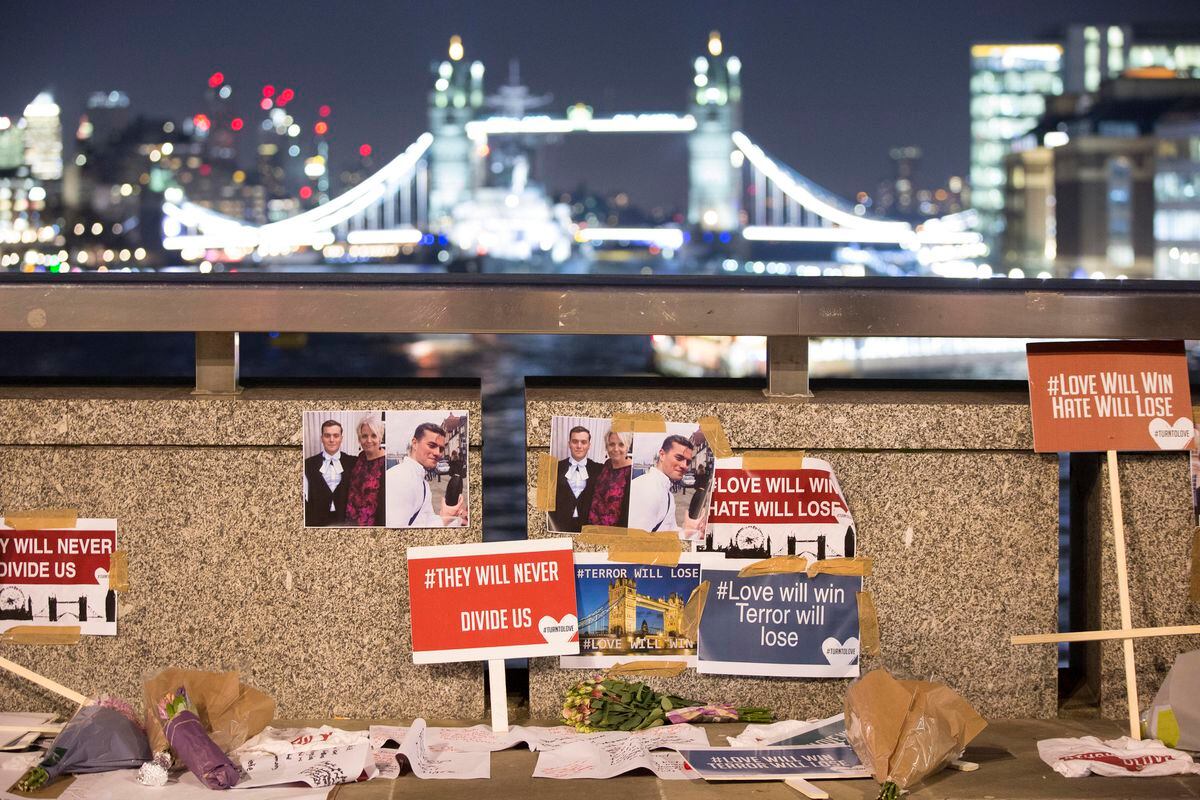Tributes left on London Bridge to Jack Merritt and Saskia Jones