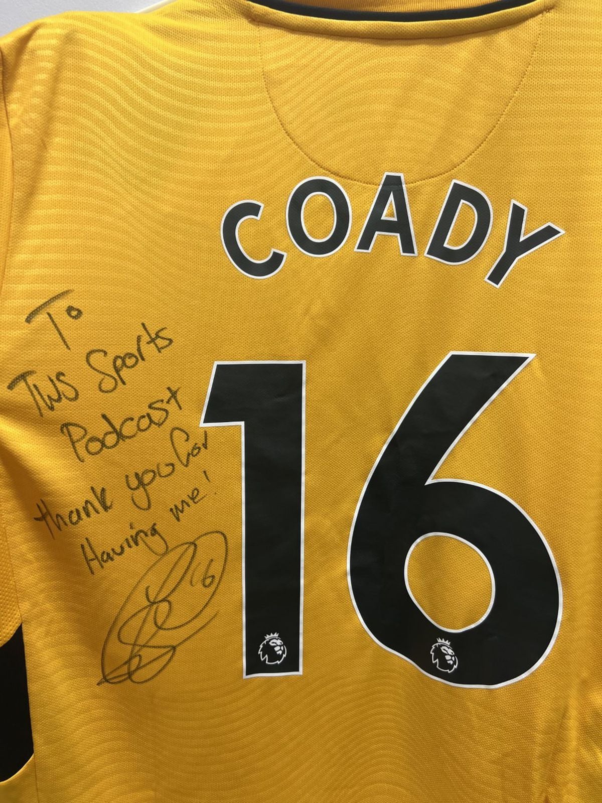Conor Coady signed a shirt for the podcast team