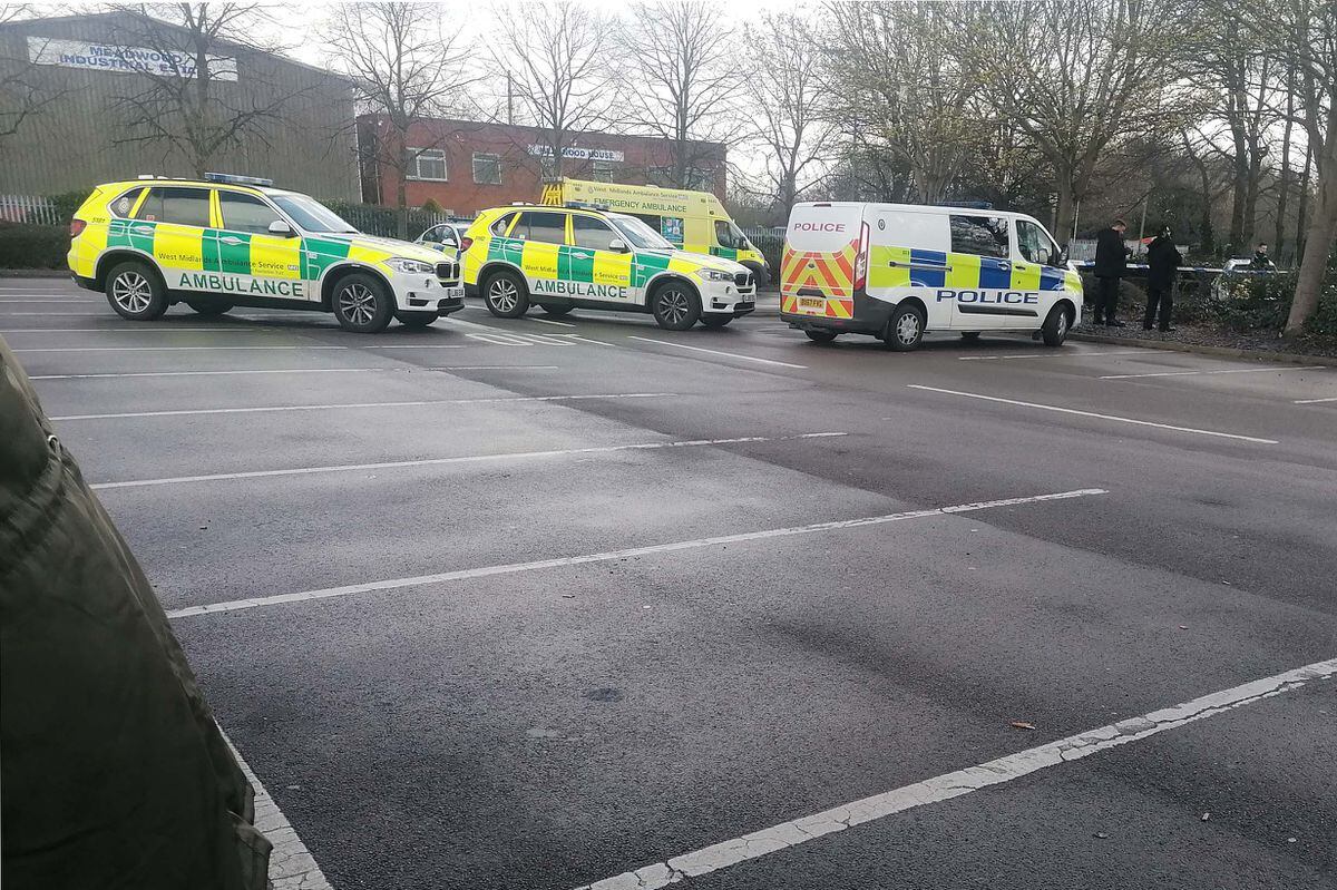 Emergency services at the scene where a newborn baby was found dead in the car park of Morrisons in Bilston