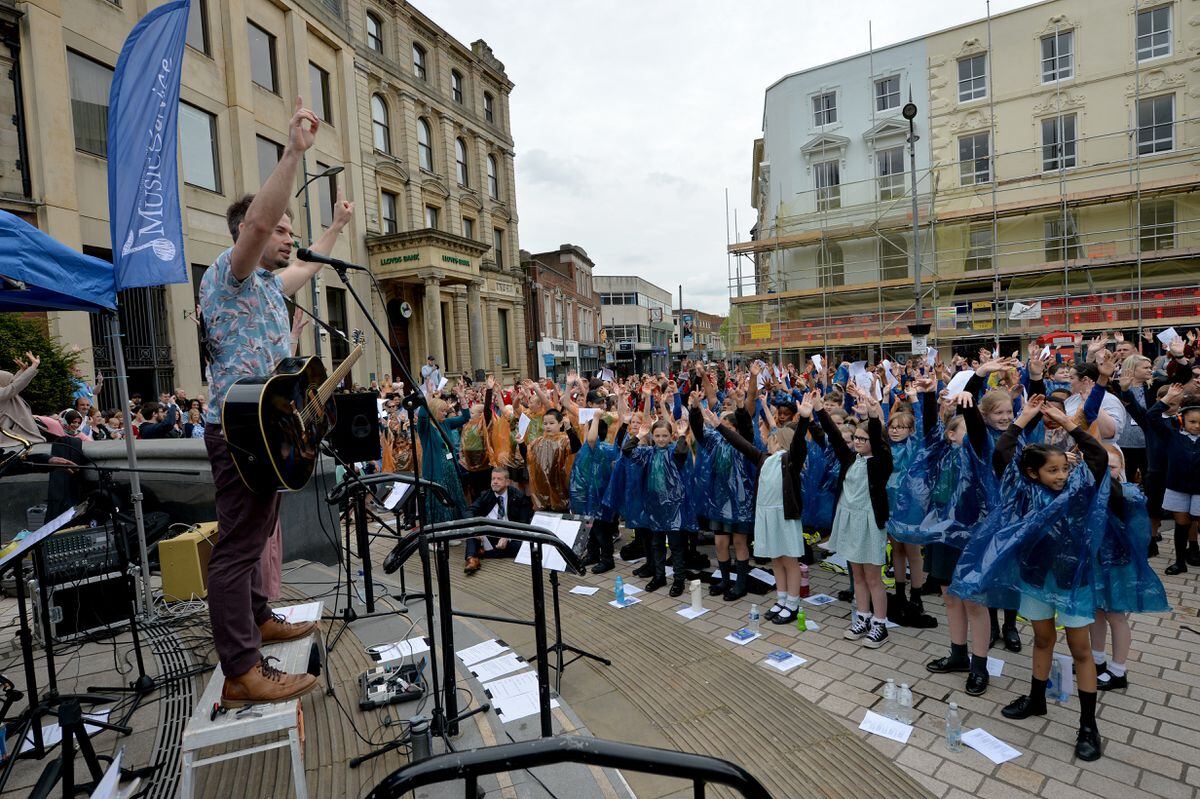 The children sang along with the help of Paul Wilcox from the Wolverhampton Music Service 