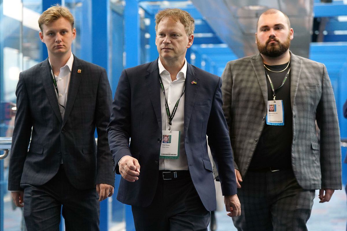 Grant Shapps (centre) during day three of the Conservative Party annual conference at the International Convention Centre in Birmingham. 