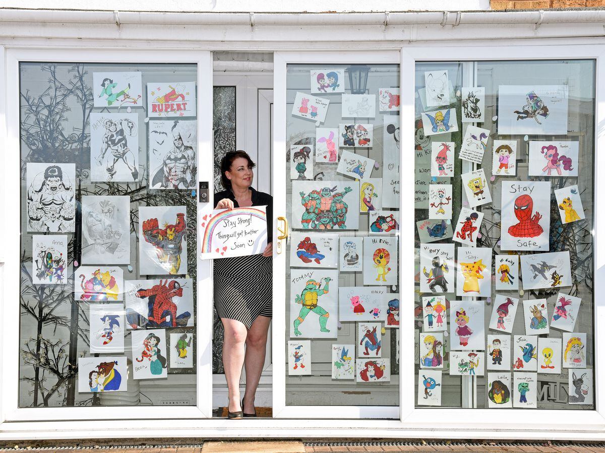 Mandy Rayner has been making window displays for children using pictures of superheroes and other favourite characters.