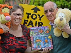 Geoff and Linda Price prepare for the toy and train collectors fair 