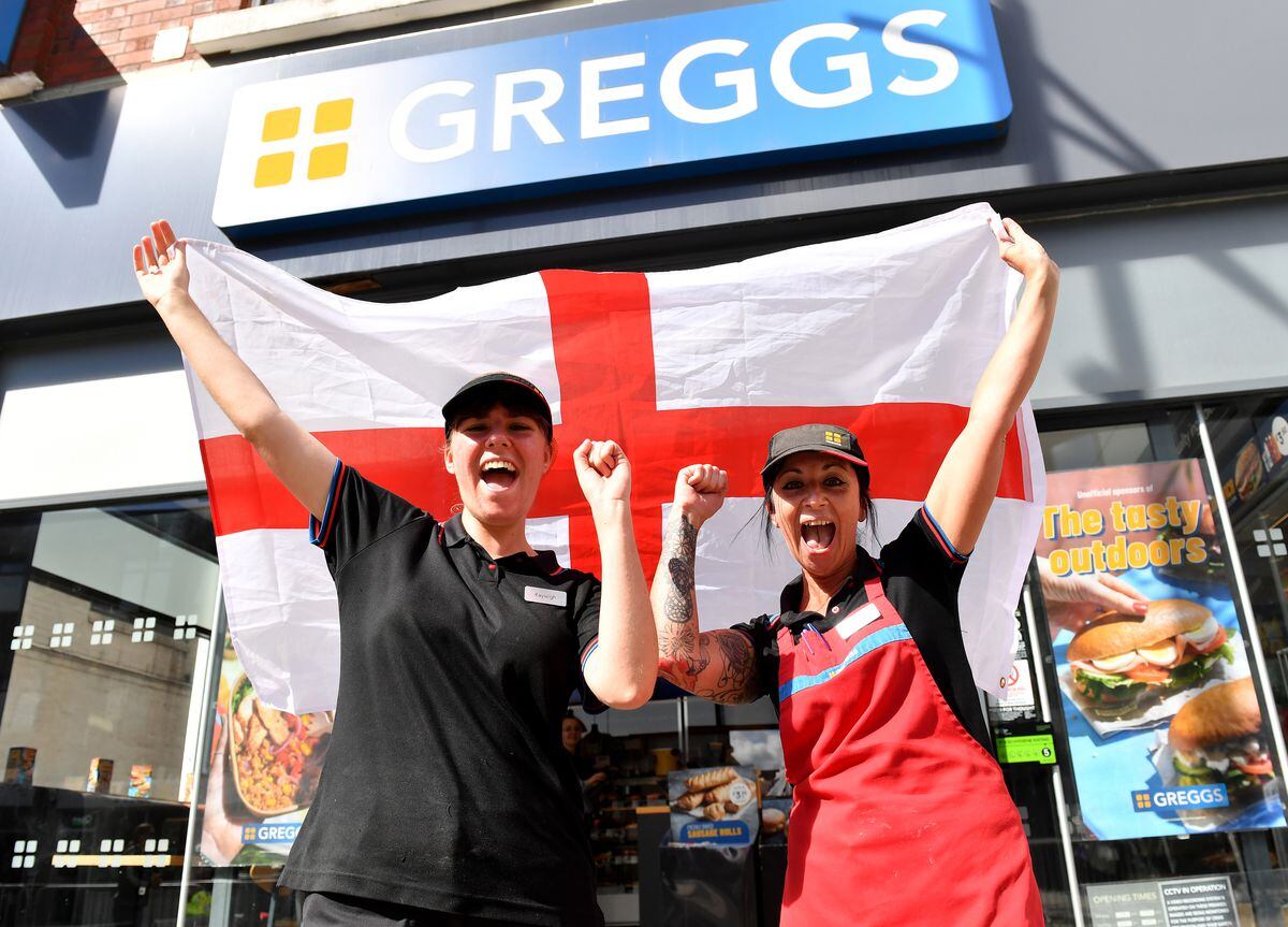 Kayleigh Jones and Marcia Allen-Shaw from Greggs show their support in Wolverhampton