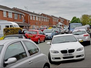 Cars parked outside Lodge Farm Primary School, Willenhall after parents were 'banned' from parking in the school car park