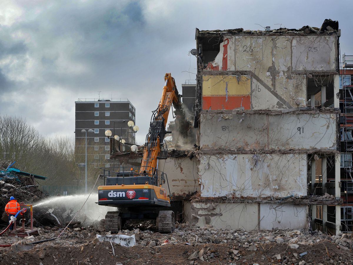 One of the low-rise blocks at Chervil Rise in Heath Town being demolished