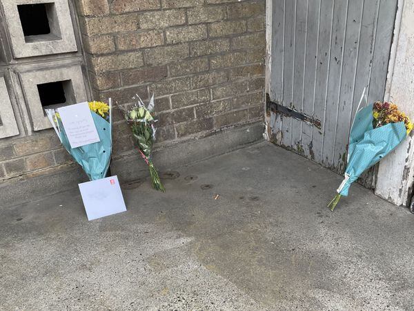 Floral tributes at the scene in Churchill Terrace, Chingford, east London, after 45-year-old James Markham was stabbed to death (Laura Parnaby/PA)
