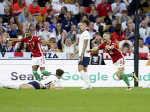 Hungary's Zsolt Nagy, second right, jubilates after scoring his sides third goal during the UEFA Nations League soccer match between England and Hungary at the Molineux stadium in Wolverhampton, England, Tuesday, June 14, 2022. (AP Photo/Jon Super).