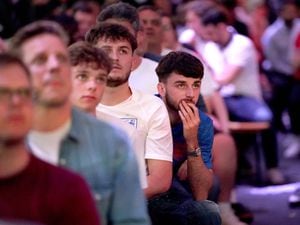 A fan at BOXPARK in Croydon reacts watches the Euro 2020 semi final match between England and Denmark. Picture date: Wednesday July 7, 2021..