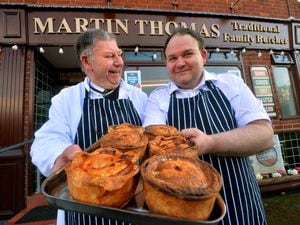 Martin Thomas and Craig Thomas show off some of the top quality pies produced at the butchers