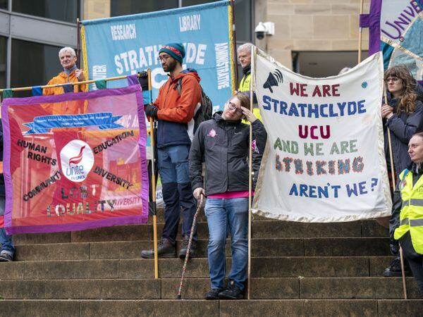 Lecturers and other university staff at a previous strike in Glasgow