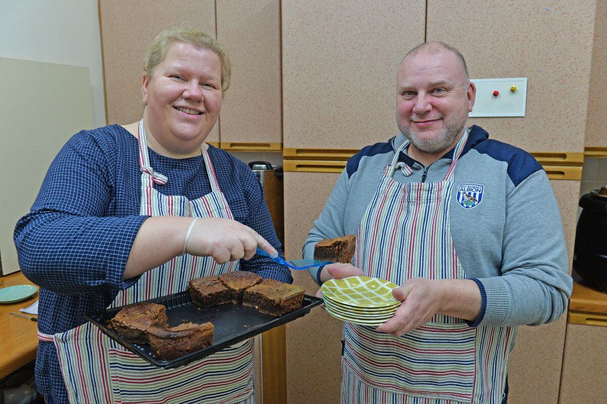 Rev Esther Gladwish and volunteer Neil Baker prepare lunch for those attending the Place of Welcome at Wednesbury Baptist Church