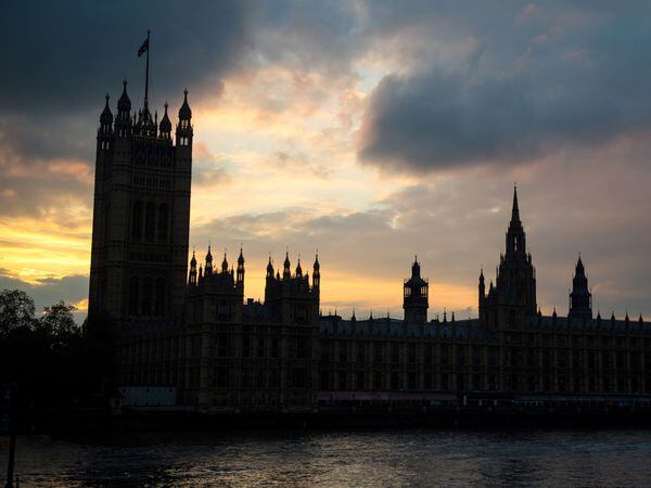 General view of sunset behind the Houses of Parliament