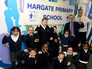 Hargate Primary in West Bromwich who have been awarded an outstanding ofsted. Head teacher Andrew Orgill and deputy head Richard Hipkiss (white shirt) with pupils celebrating.