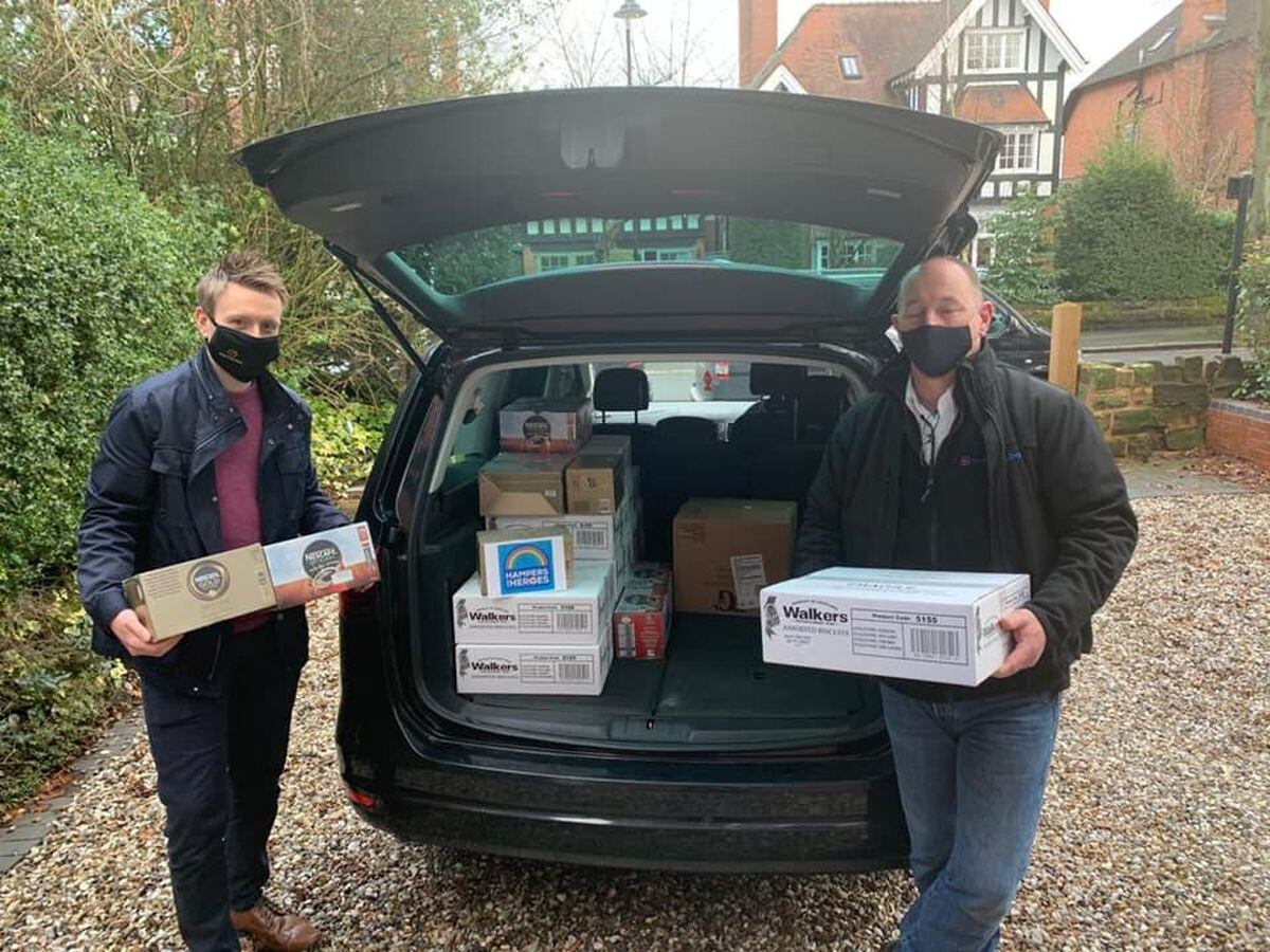 Tom Williams, left, and Richard Scandrett with the donations of tea, coffee and biscuits
