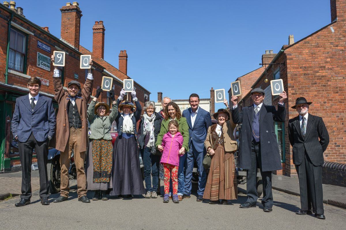 Staff at Black Country Living Museum and nine millionth customer and family