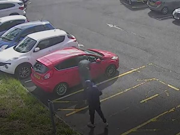 The thieves were seen on CCTV breaking into a Fiesta. Photo: West Midlands Police