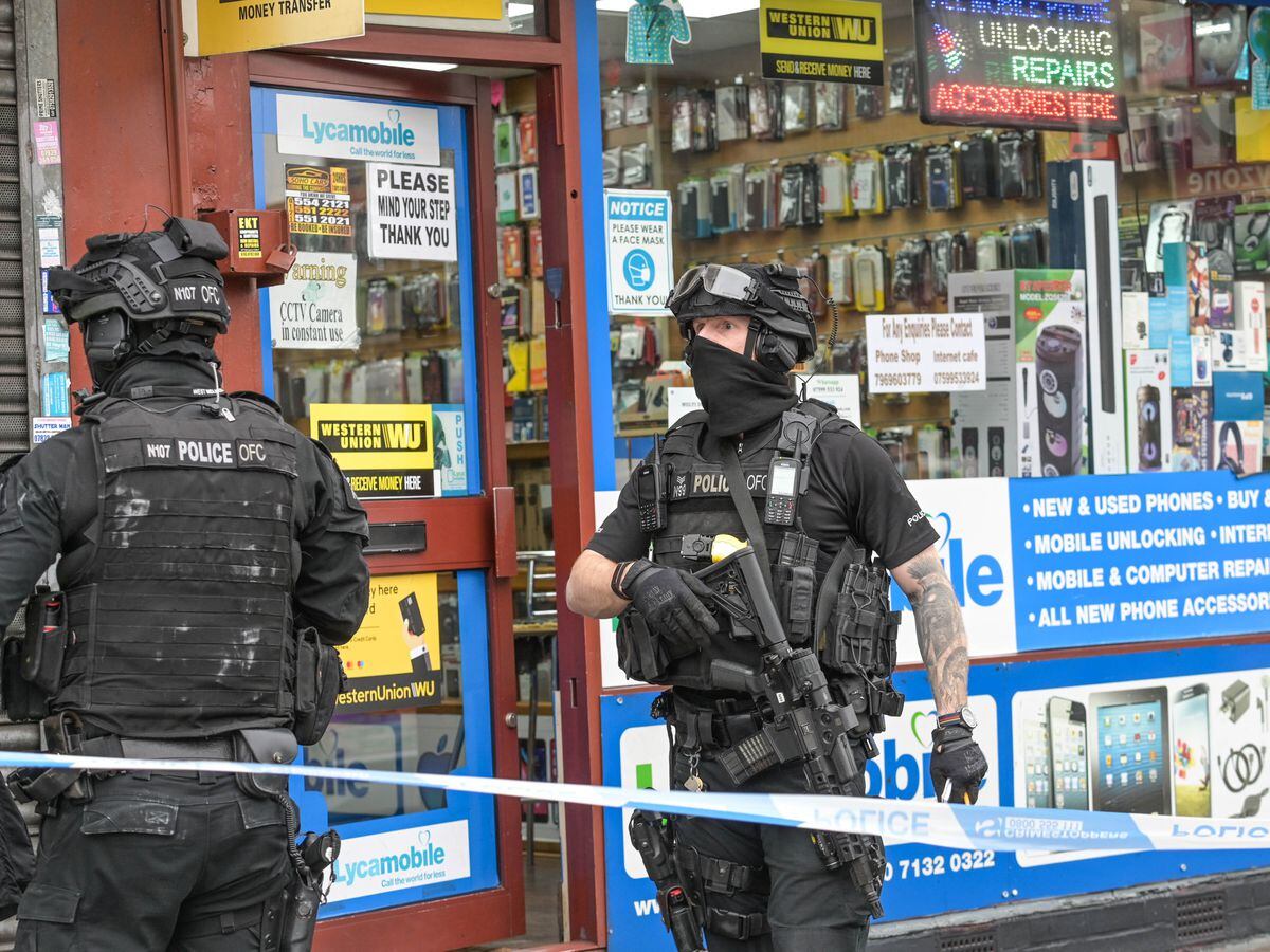 Armed police at the scene in Soho Road, Handsworth. Photo: SnapperSK