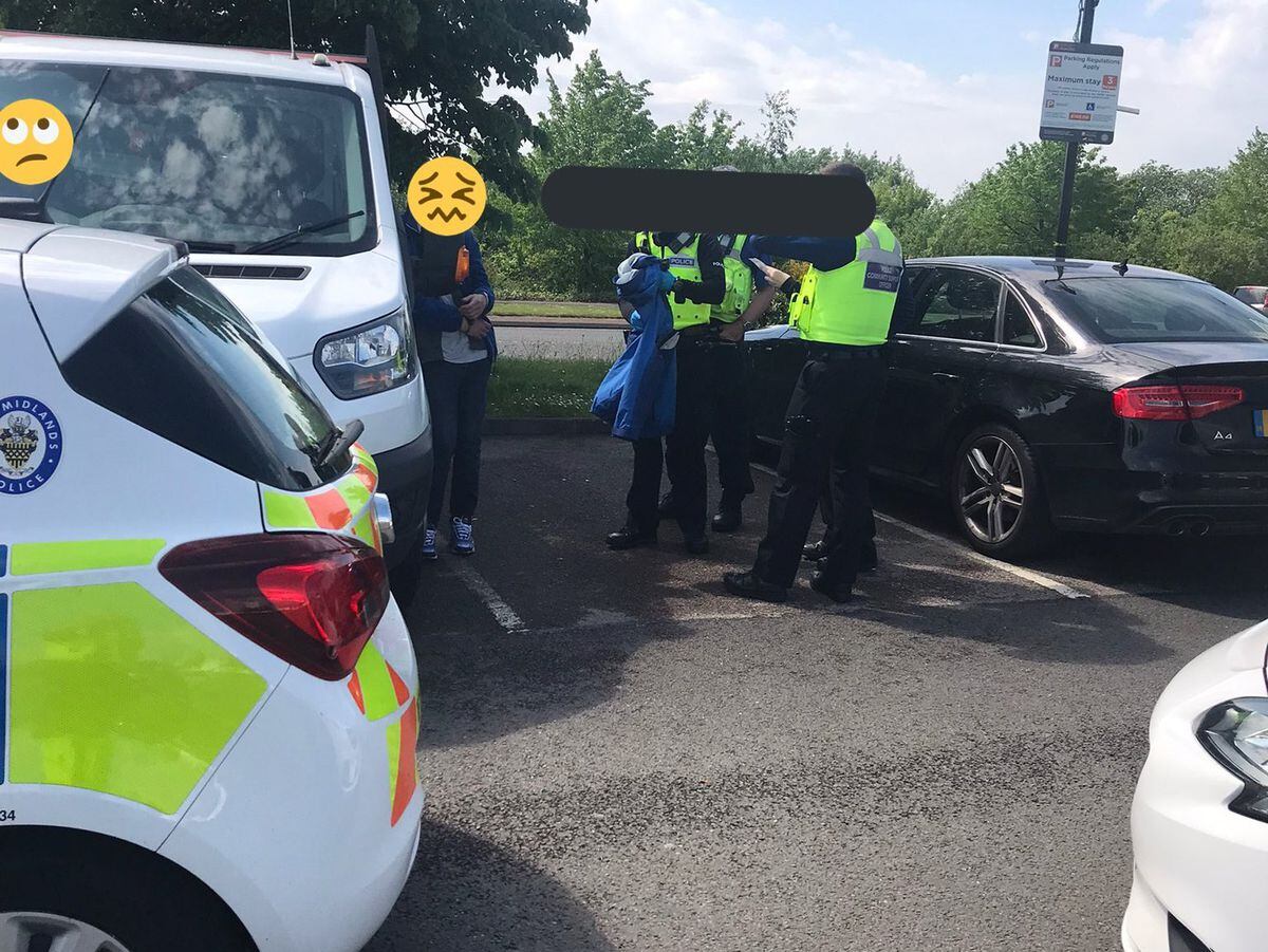Wednesfield PCSOs detaining the shoplifter (Picture: WMP)