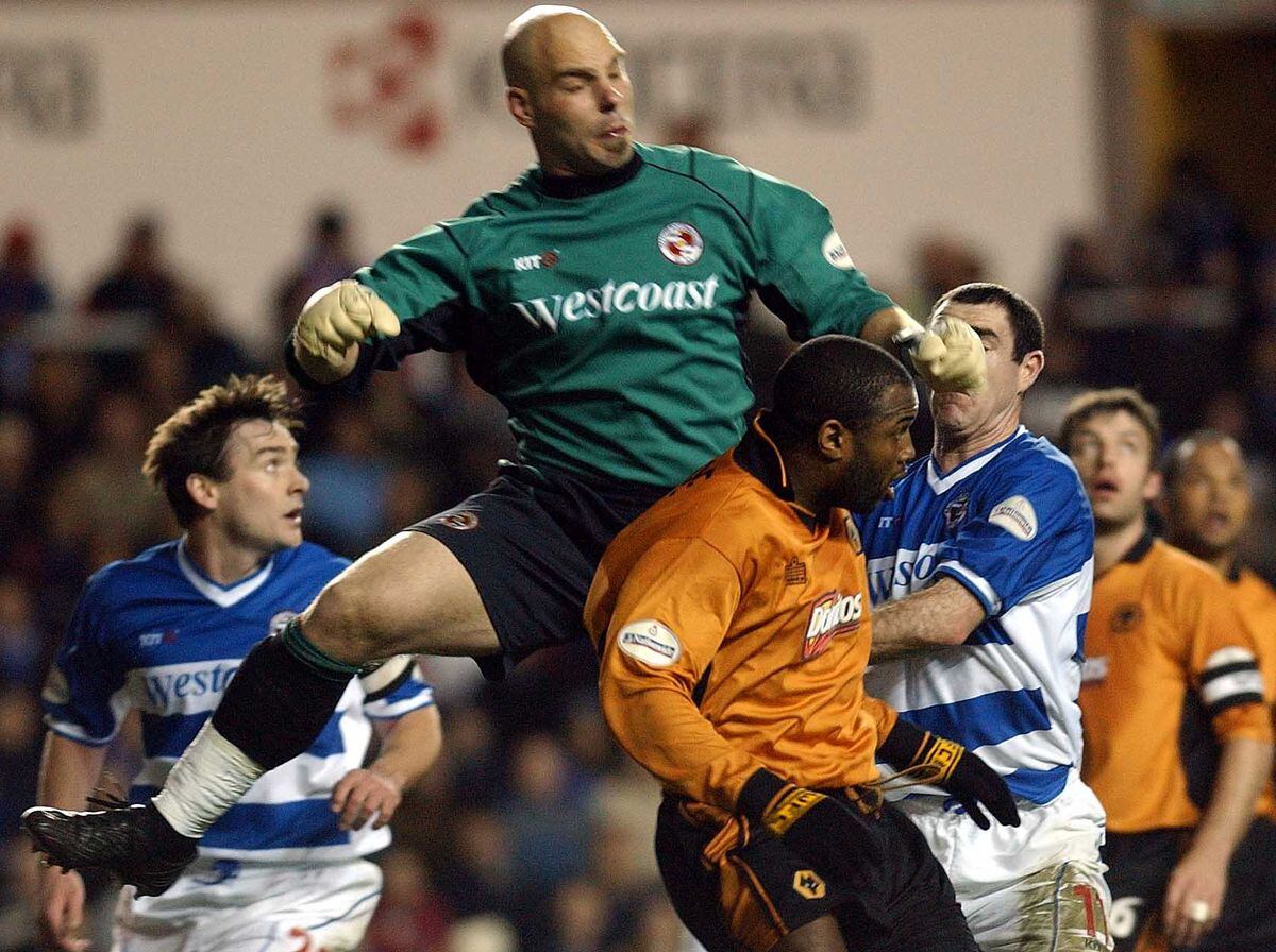 COPYRIGHT EXPRESS & STAR - 12/03/2003 PIC - GAVIN DICKSON. READING V WOLVESNathan Blake is beaten in the air by keeper, Marcus Hahnemann