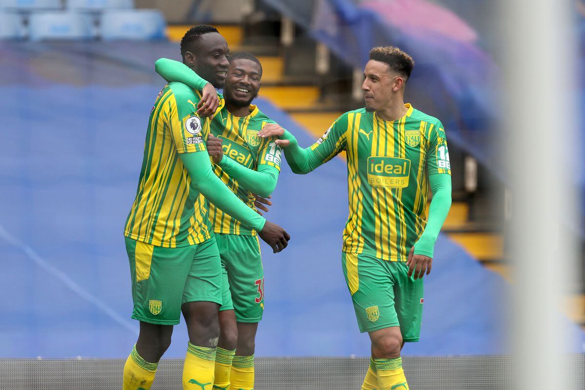 Mbaye Diagne of West Bromwich Albion celebrates after he scores a goal to make it 1-4 with Ainsley Maitland-Niles of West Bromwich Albion and Callum Robinson of West Bromwich Albion. (AMA)