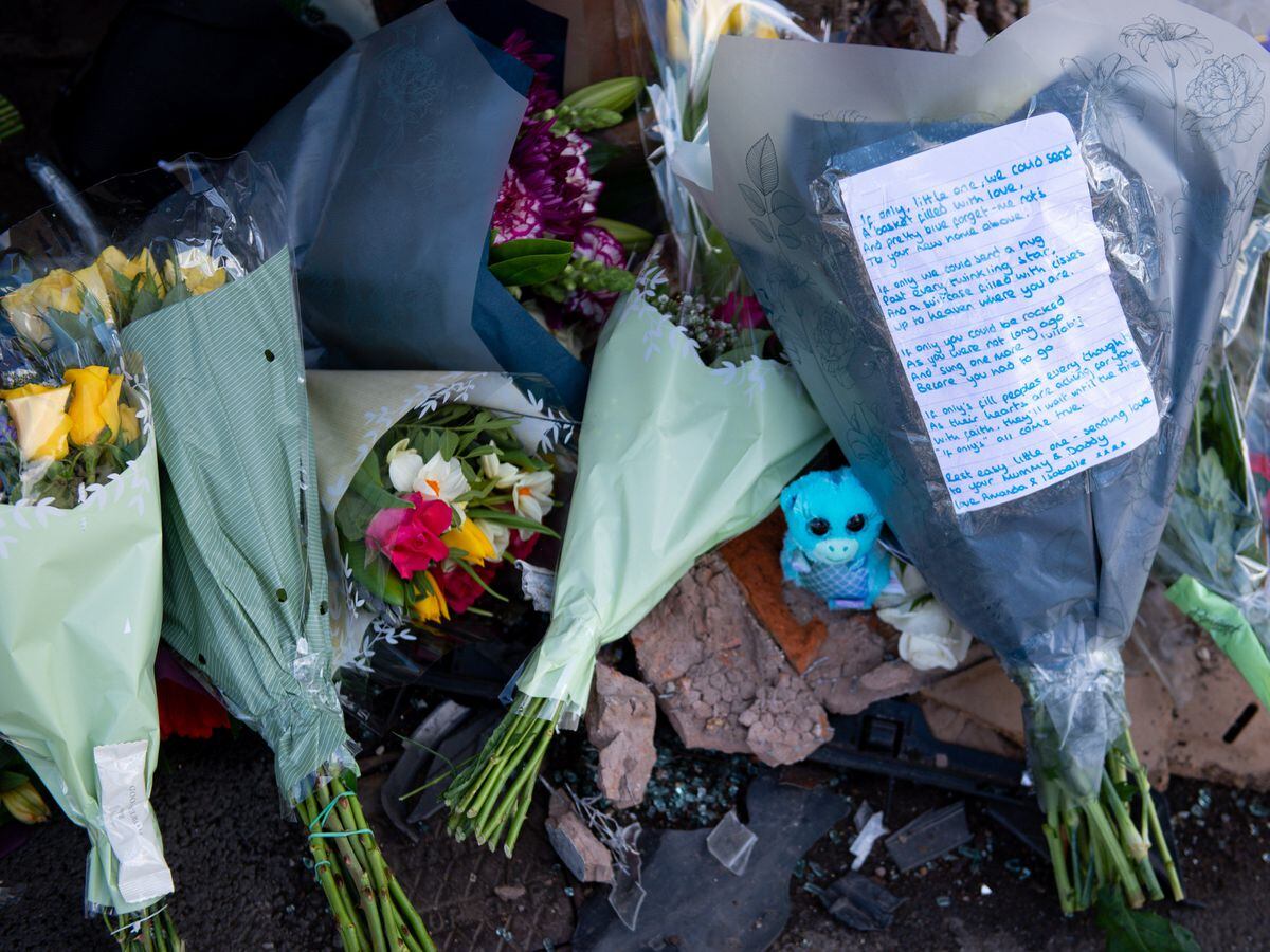 Flowers and tributes left at the scene on High Street, Brownhills