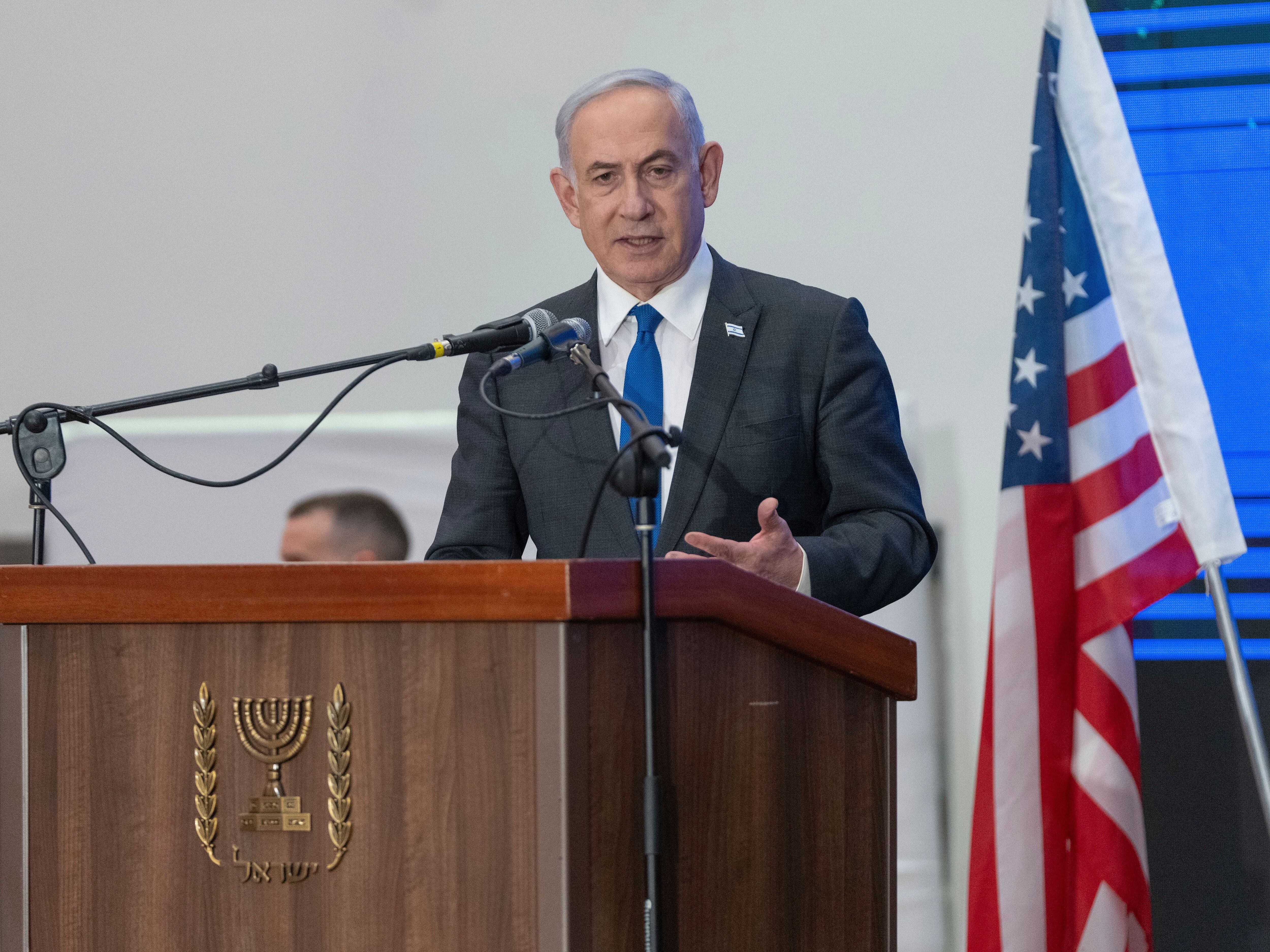 Cracks widen in Netanyahu’s government as top political rival heads to US talks