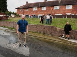 Marco Longhi MP with residents at the site of the leak on Woodfield Road, Lower Gornal 
