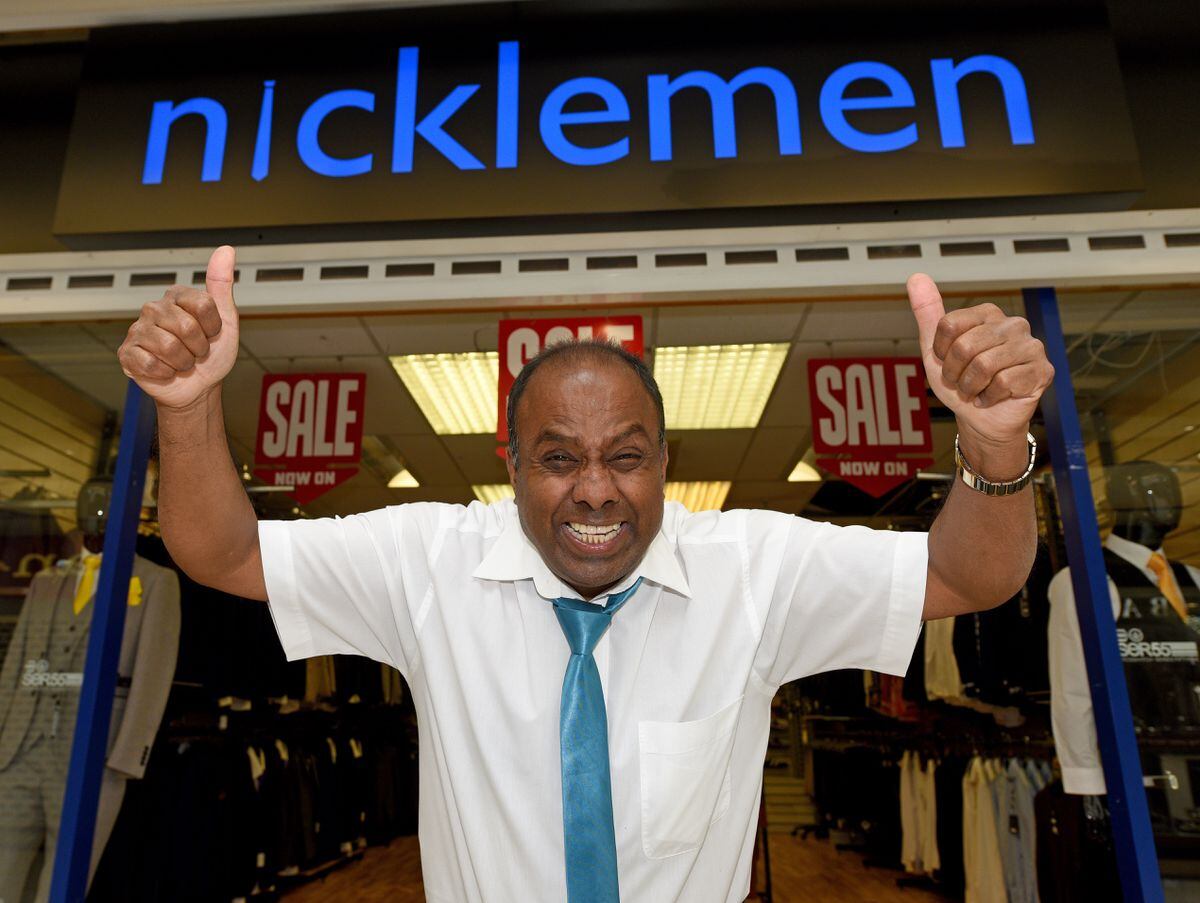 Ashok Patel, manager of Nicklemen in the Mander Centre, is overjoyed as shoppers return