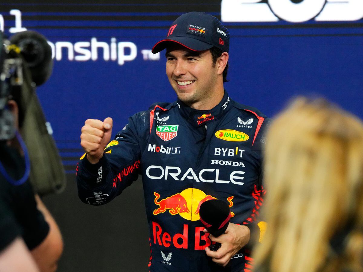 Sergio Perez celebrates pole position