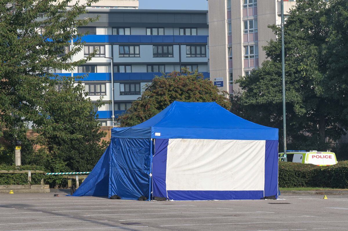 A forensic tent in the Asda car park. Photo: SnapperSK