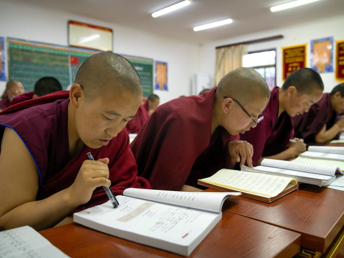 Tibetan monks learning Mandarin