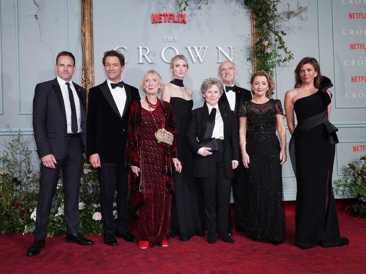 Left to right, Jonny Lee Miller, Dominic West, Marcia Warren, Elizabeth Debicki, Imelda Staunton, Sir Jonathan Pryce, Lesley Manville and Claudia Harrison at the world premiere of The Crown series five at the Theatre Royal in London