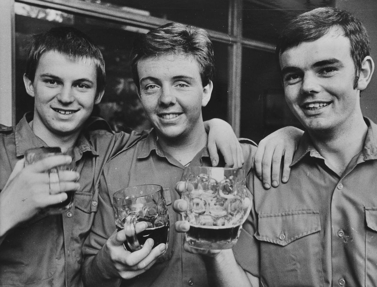 Shropshire survivors, from left, Trevor Wright of Broseley, Paul Entwhistle of St Martins, and Sub Lieutenant Colin Haley, celebrate their return to Britain.