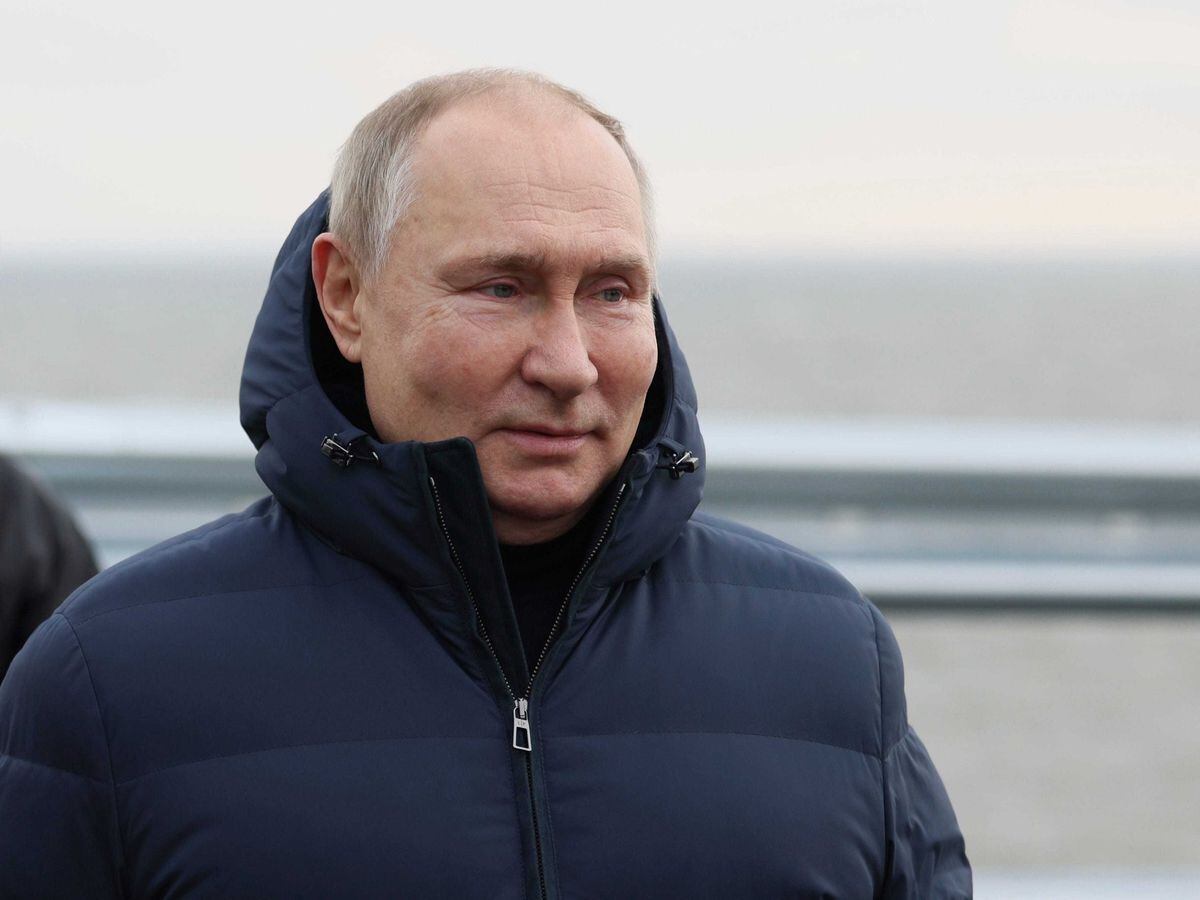 Russian President Vladimir Putin visits the bridge connecting the Russian mainland and the Crimean peninsula