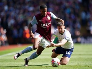 Tottenham Hotspur's Clement Lenglet pulls back Aston Villa's Leon Bailey