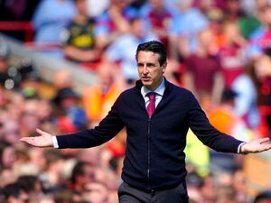               Aston Villa manager Unai Emery gestures on the touchline during the Premier League match at Anfield