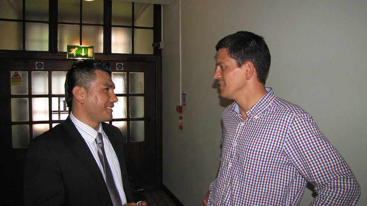 Keen political student Rohullah with David Miliband