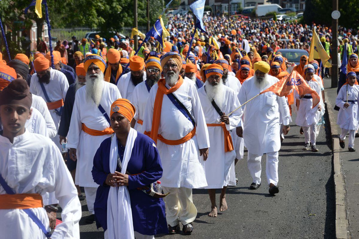 The parade to mark the 550th birthday of Guru Nanak Dev Ji winds it way through the streets of Smethwick