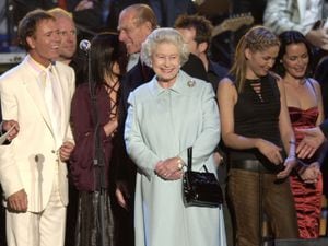 Queen Elizabeth II met the artists on stage at the event