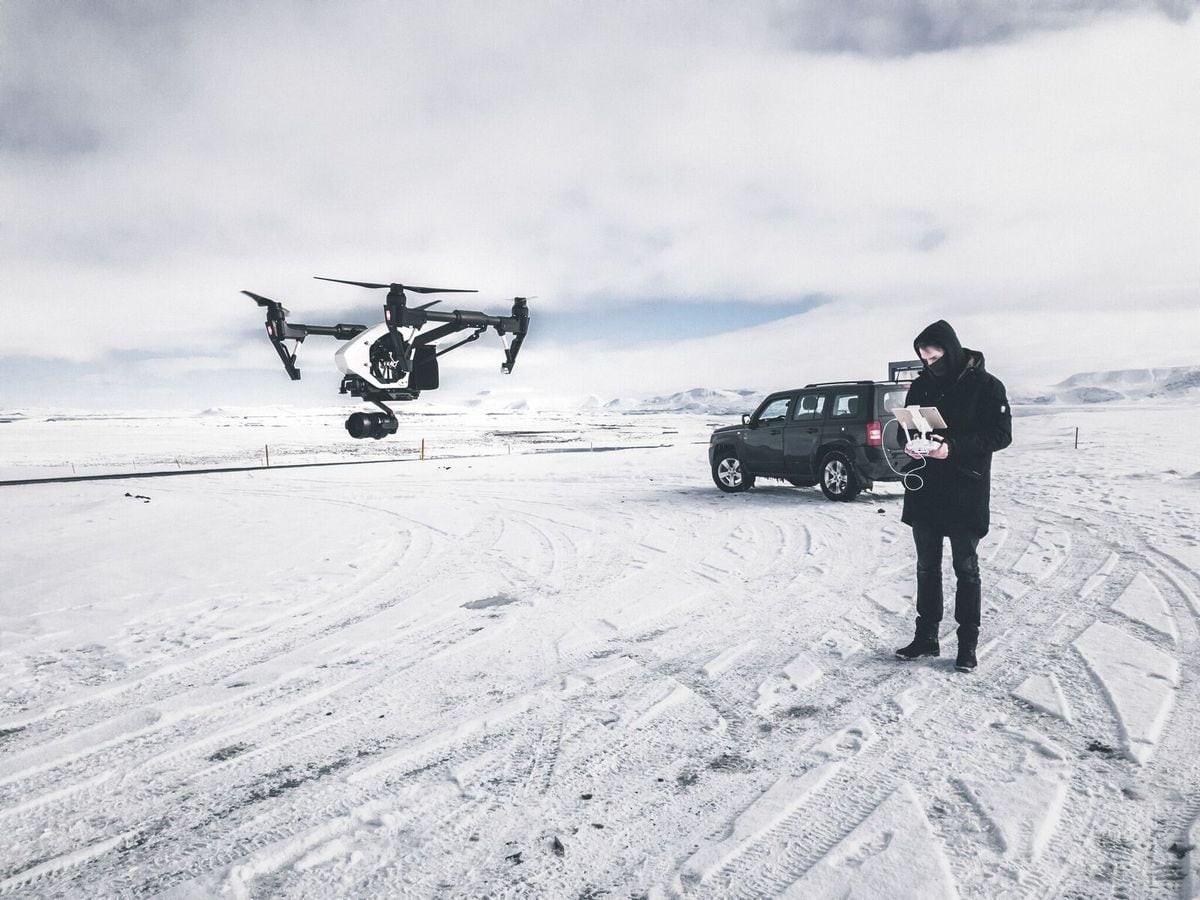 Alex Hatfield and his drone on location in Iceland