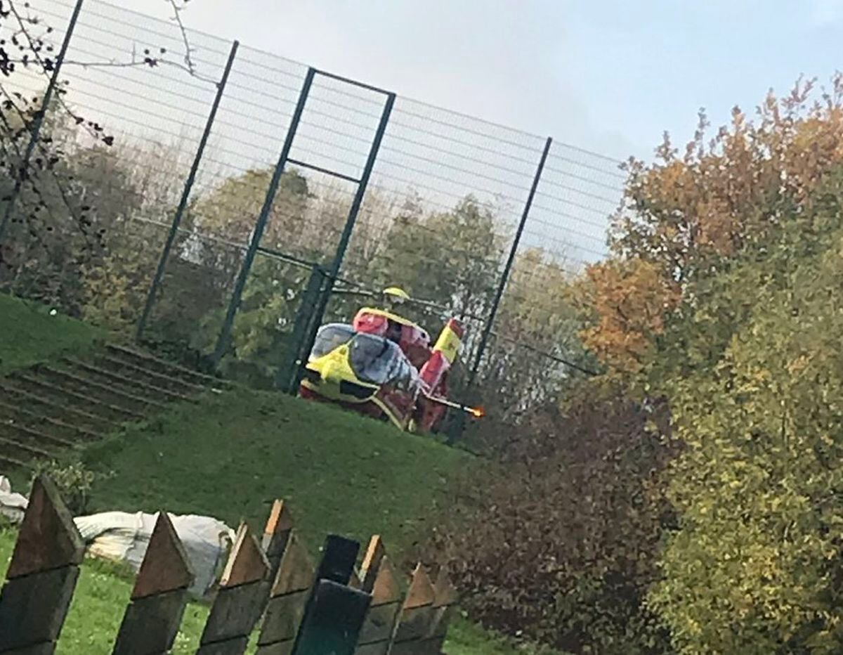 The air ambulance lands nearby. Picture: Teresa