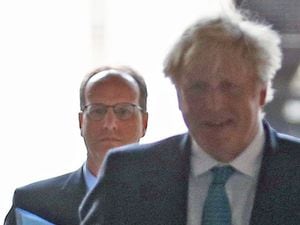 Boris Johnson with his principal private secretary, Martin Reynolds (left), who sent an email to more than 100 Downing Street employees asking them to "bring your own booze" to a gathering in May 2020. Photo: Kirsty Wigglesworth/PA Wire