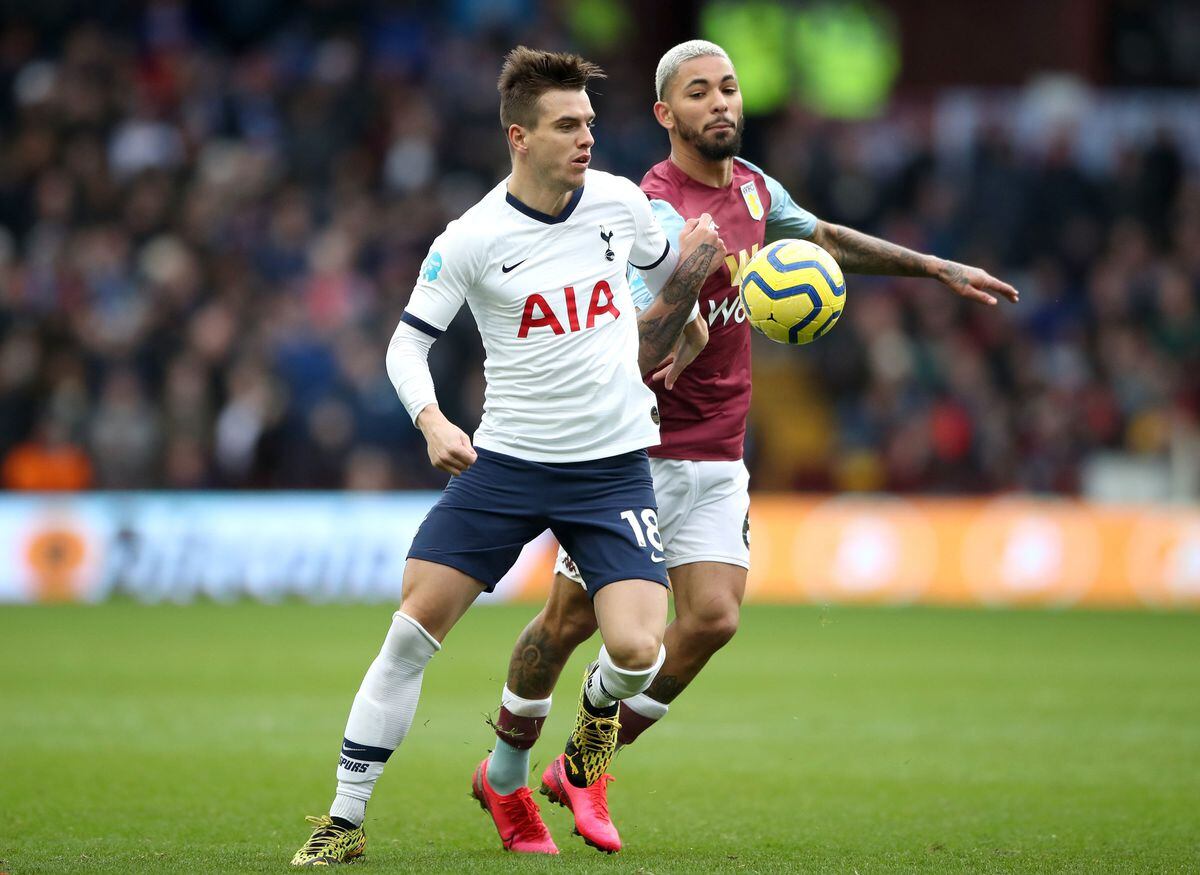 Tottenham Hotspur's Giovani Lo Celso (left) and Aston Villa's Douglas Luiz battle for the ball 