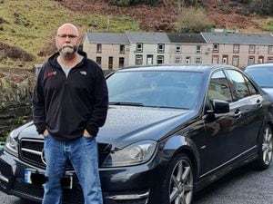 Sean Alabaster with his car after recieving a CAZ fine for non-payment
