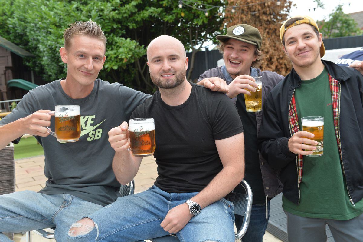 Sam Holliday, Rob Pritchard, Lewis Evans and Elliott George enjoy a drink at The Wall Heath Tavern, Wall Heath.