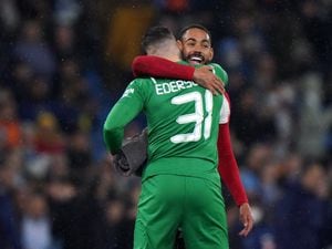 Manchester City goalkeeper Ederson (back to camera) and Atletico Madrid's Santos Matheus Cunha after the UEFA Champions League Quarter Final first leg match at the Etihad Stadium, Manchester. Picture date: Tuesday April 5, 2022..
