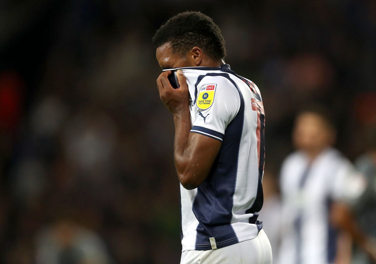 WEST BROMWICH, ENGLAND - AUGUST 17: Grady Diangana of West Bromwich Albion reacts and pulls his shirt over his face after missing a chance to score during the Sky Bet Championship between West Bromwich Albion and Cardiff City at The Hawthorns on August 17, 2022 in West Bromwich, United Kingdom. (Photo by Adam Fradgley/West Bromwich Albion FC via Getty Images).